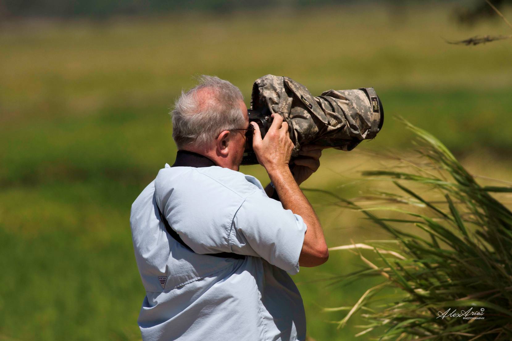 Man takes photo while birding
