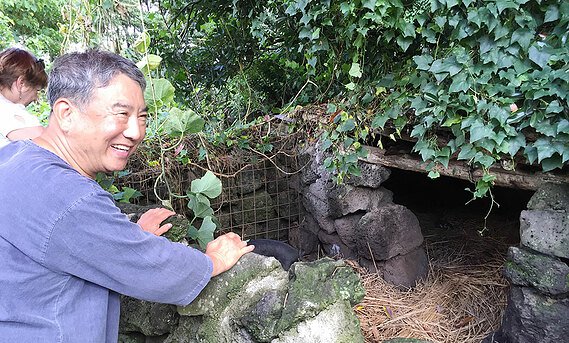 A local gives a tour of his home and farm.