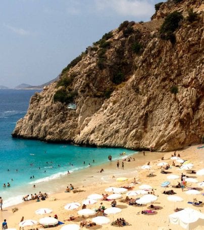 People on beach in Kalkan, Turkey