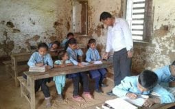 Kids being taught in a classroom