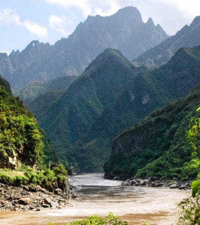 River runs between mountain peaks in China