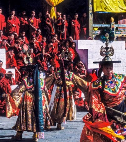 Performers and onlookers at festival in Thimphu, Bhutan