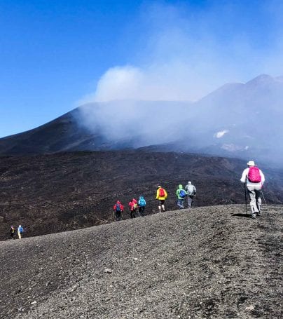 People climb Mount Etna in Italy