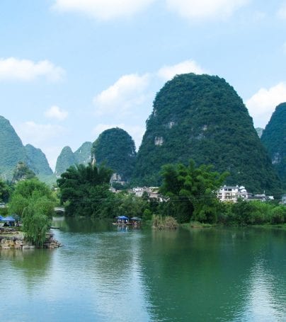 Lake with mountains surrounding it in China