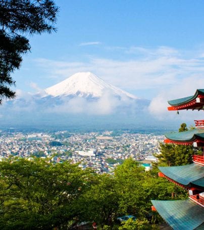 View past pagoda building toward Mount Fuji, Japan