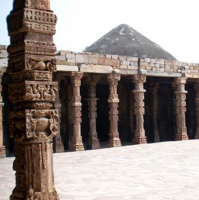 See the intricate carving details at Qutub Minar