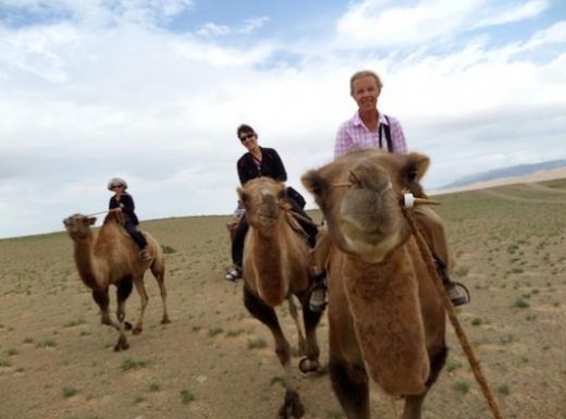 Ride a camel in the Gobi Desert