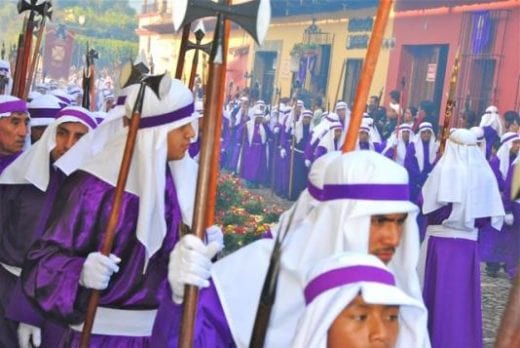 Celebrants wear purple for Good Friday processions