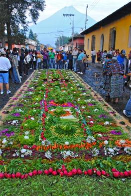 The carpets of flower petals and vegetables are transitory