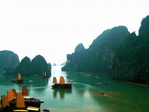 Float among limestone islands in beautiful  Halong Bay