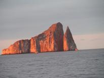 See Isla Lobos (Kicker Rock) in its sunset splendor