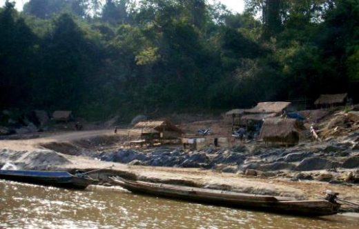 Take in village life on a leisurely float on the Mekong