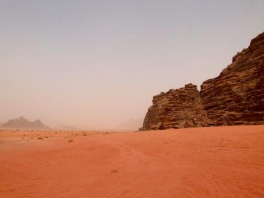 Admire the vivid morning hues of Wadi Rum