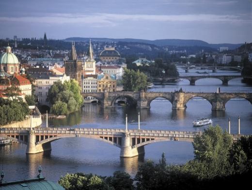 Prague is a green city located on the shore of the Vltava River.