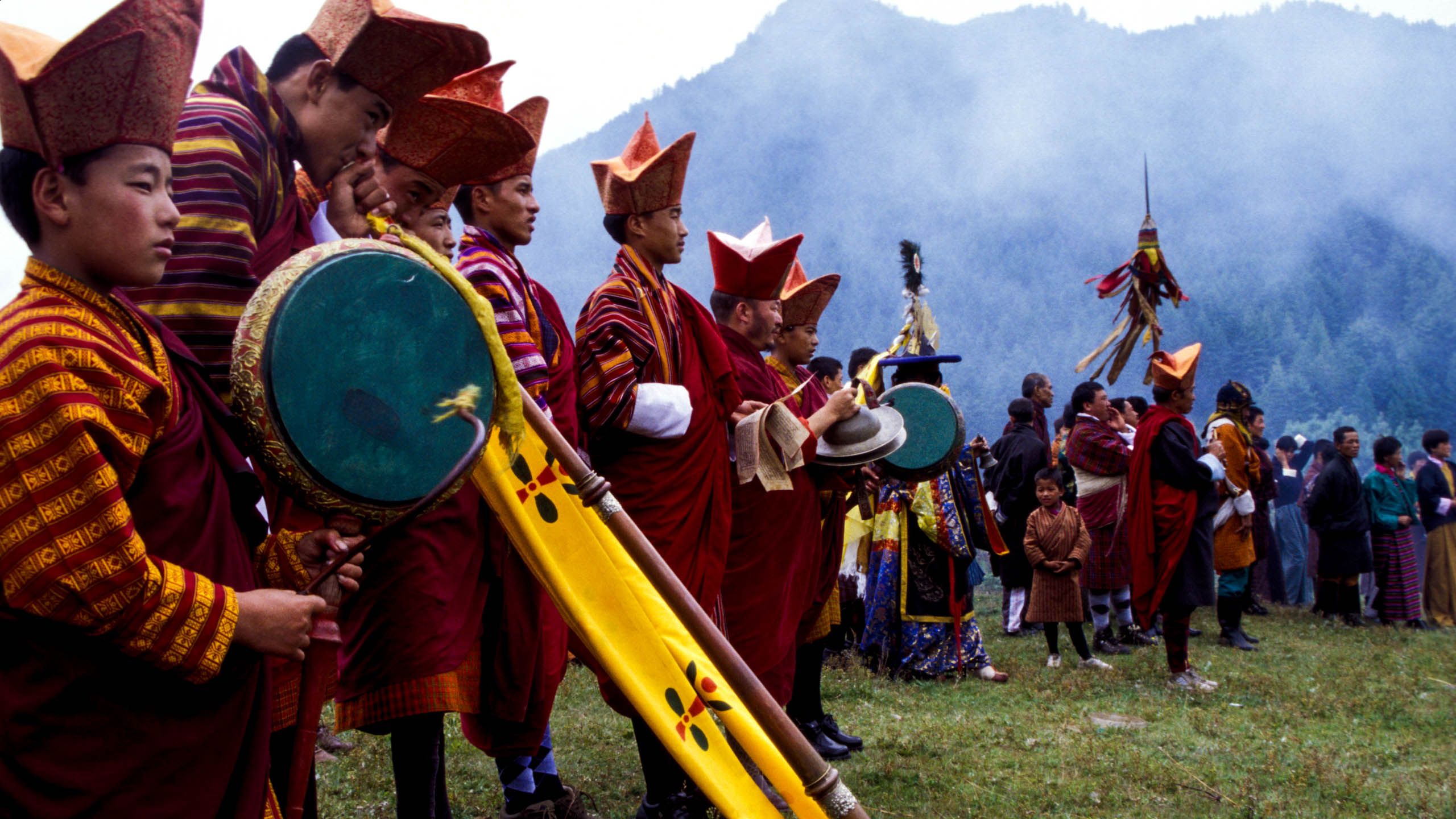 Bhutan festival performers with instruments