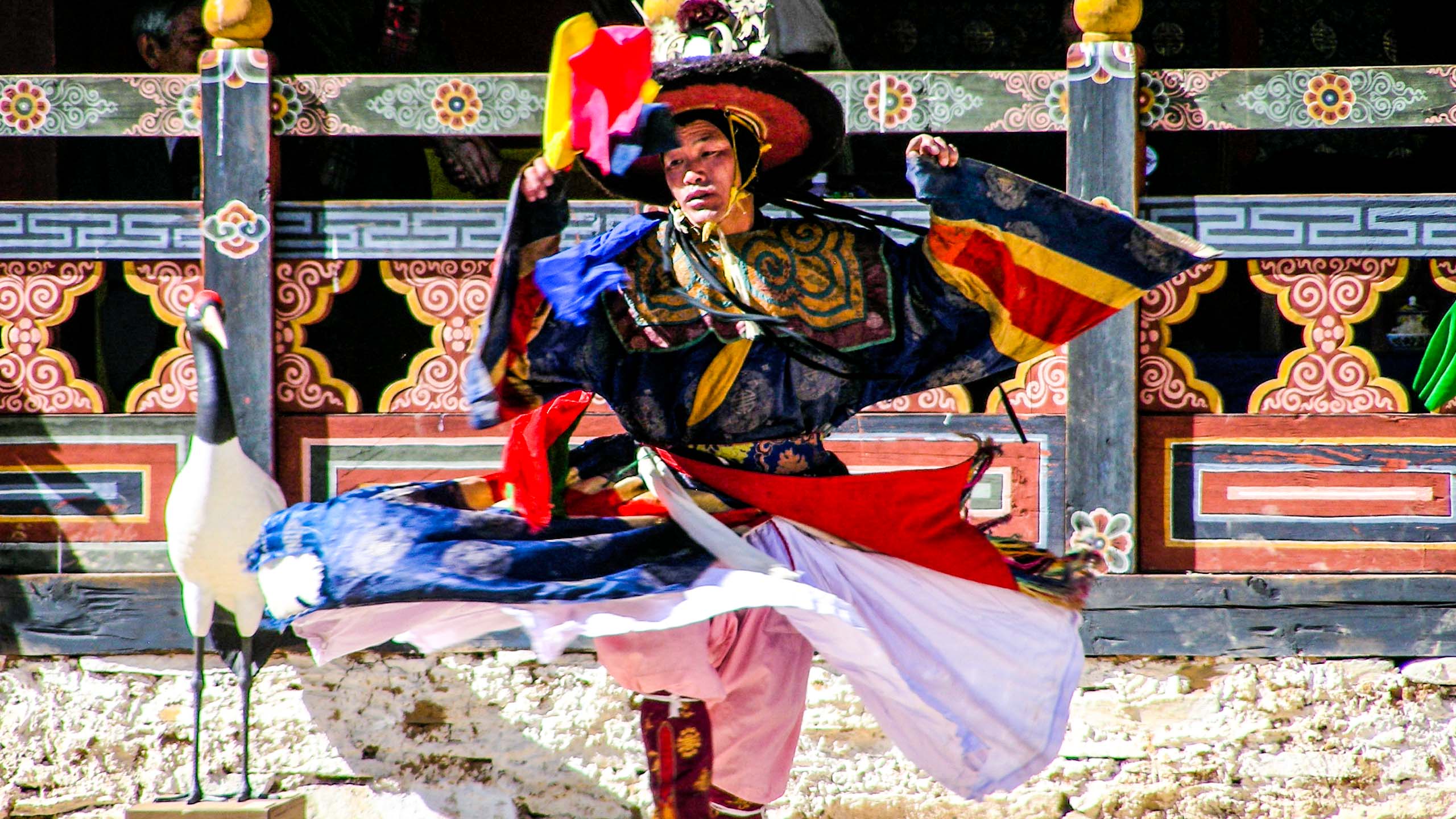 Colorfully dressed Bhutan man dances at festival