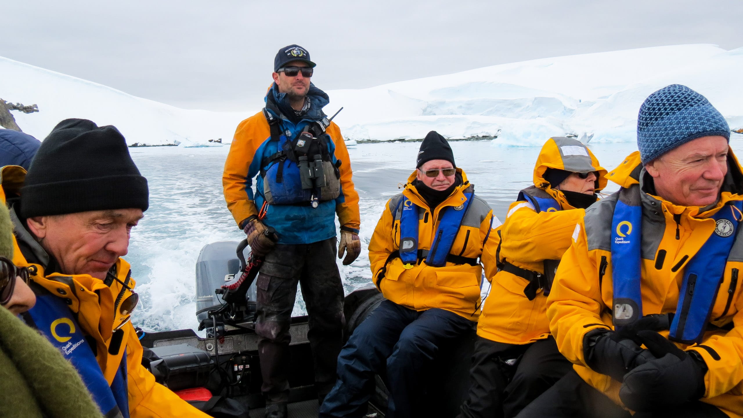 Group of travelers rides boat in Antarctica