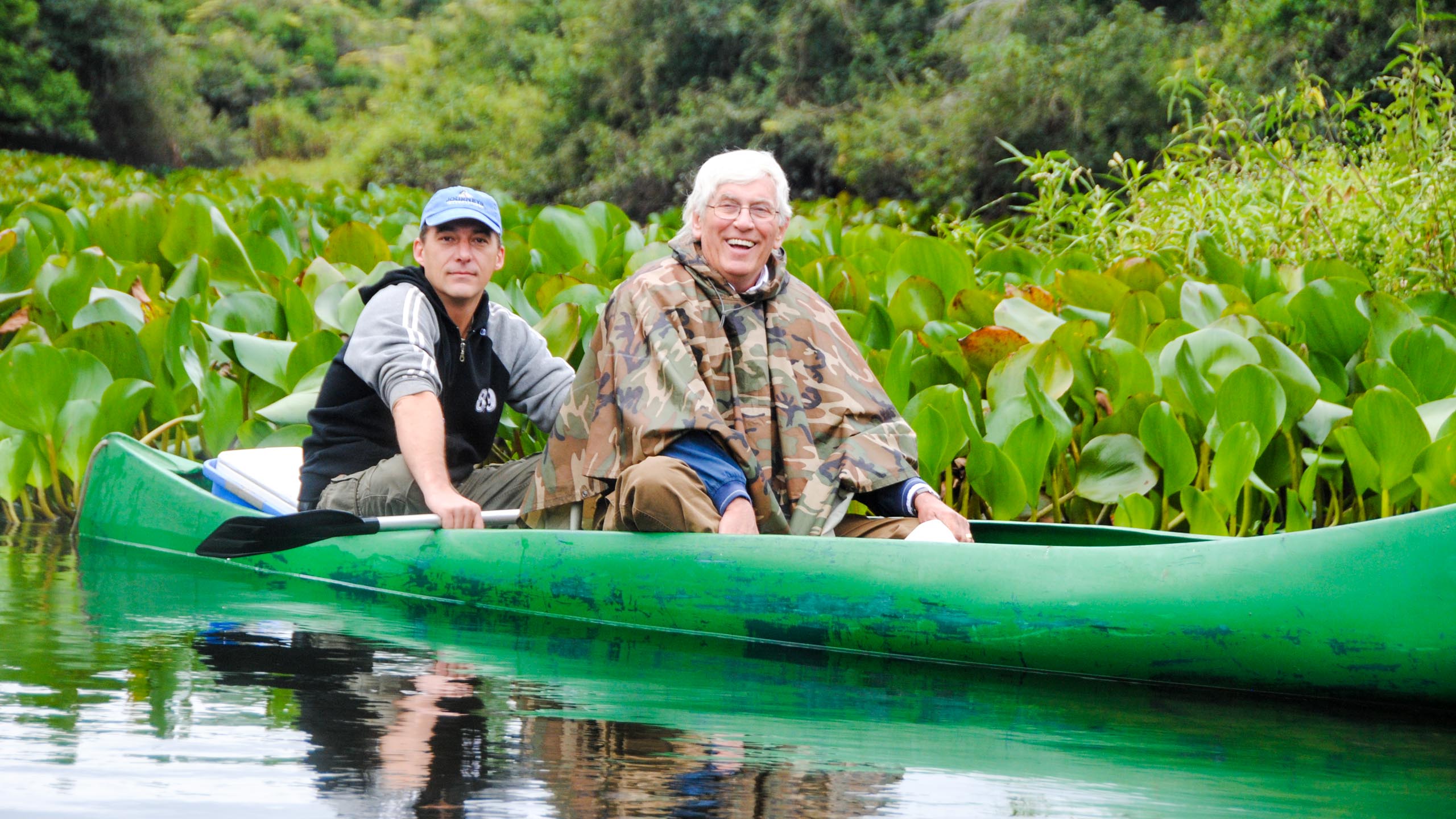 Travelers in canoe on Brazil trip