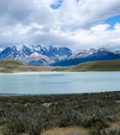 View of Patagonia mountains across lake
