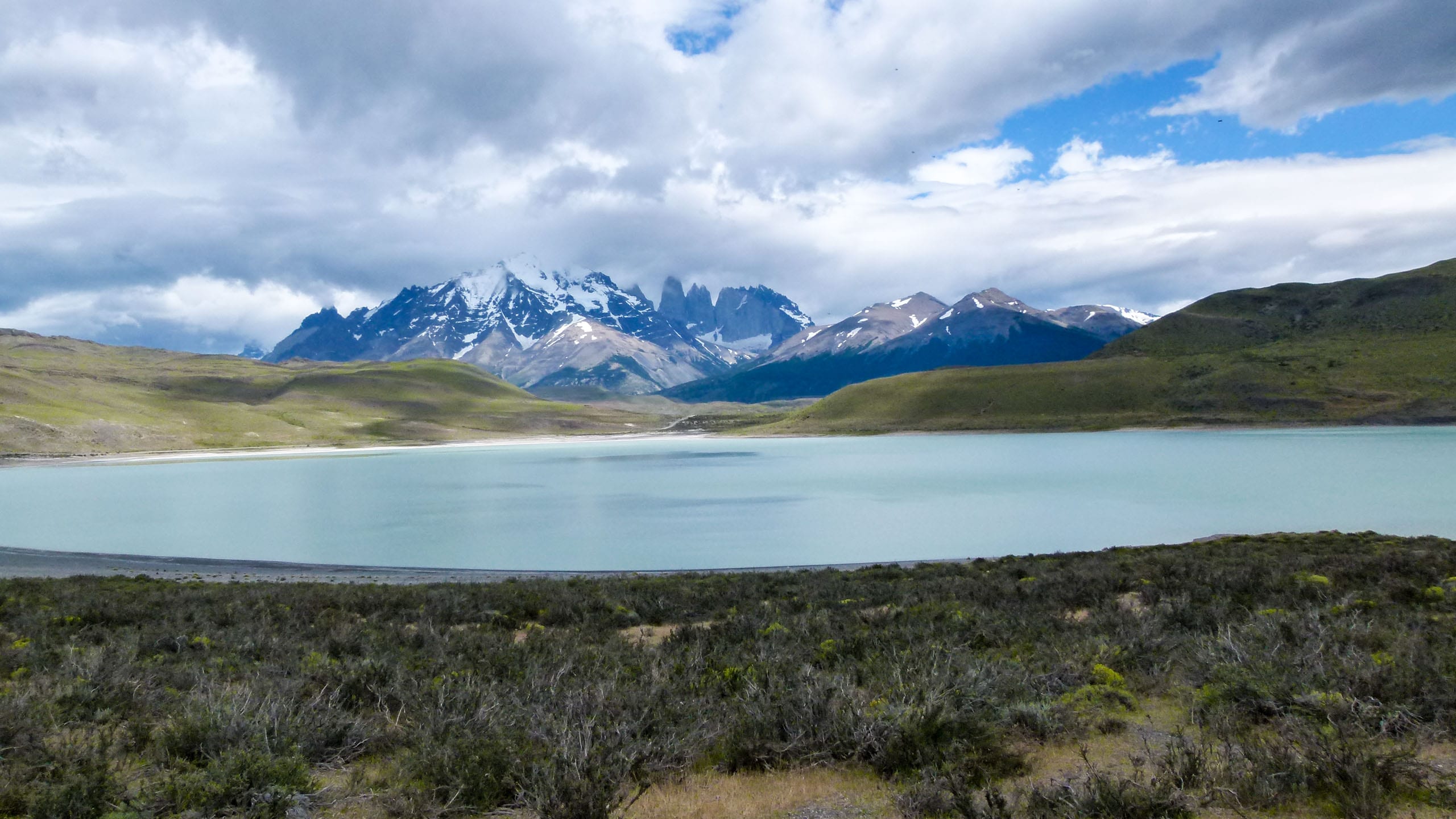 View of Patagonia mountains across lake