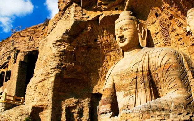 A giant stone Buddha carving in Yungang, China