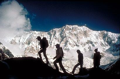 Morning hikers with the Himalayas in the background