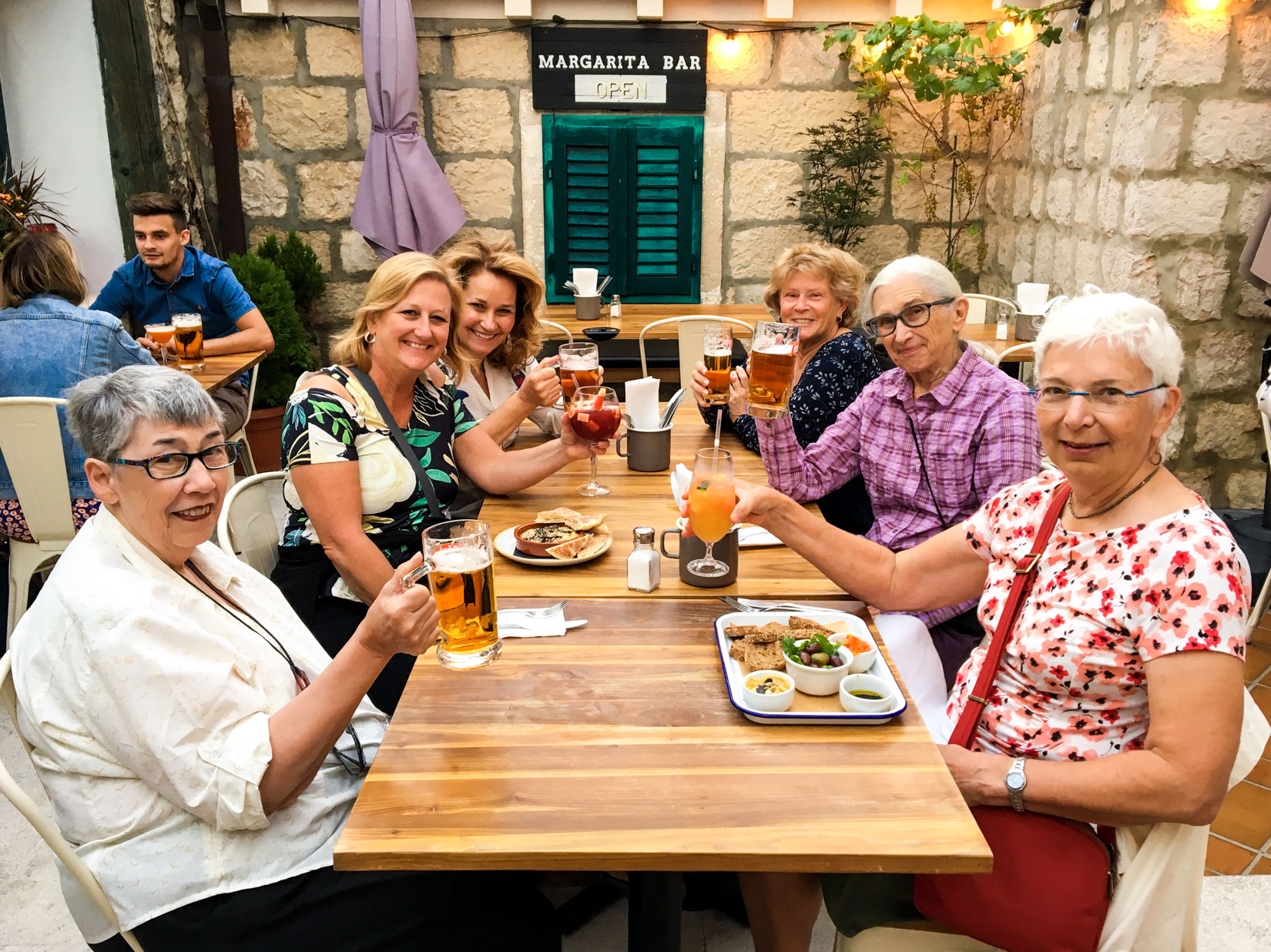 Table of women cheers in Croatia