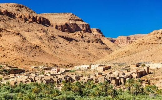 A village with traditional kasbah houses in Ziz Valley