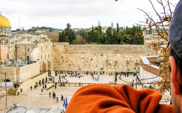 Traveler looks over view of Jerusalem