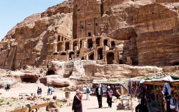 Ancient cliffside buildings in Jordan