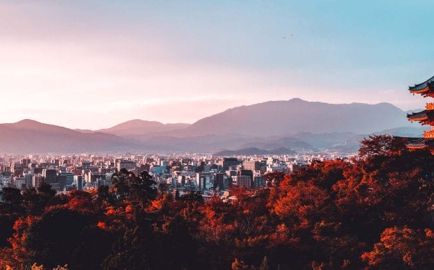 Pagoda rises above skyline of Kyoto, Japan