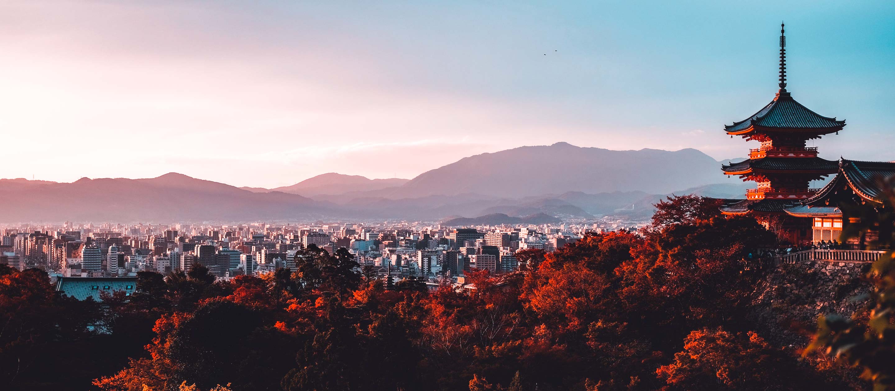 Pagoda rises above skyline of Kyoto, Japan