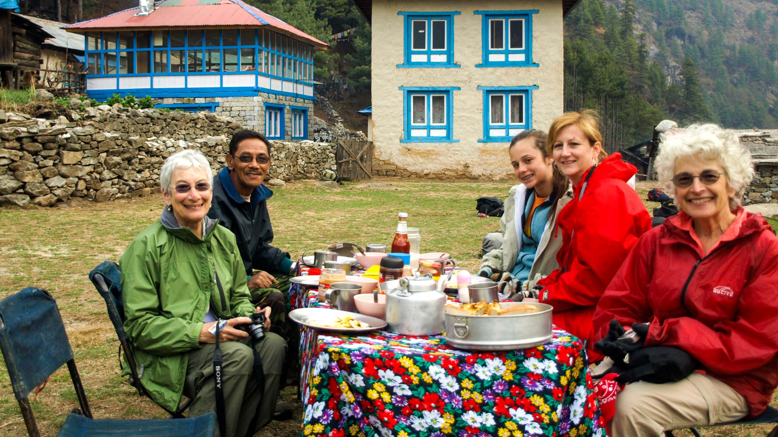 Family eats meal on trip to Nepal