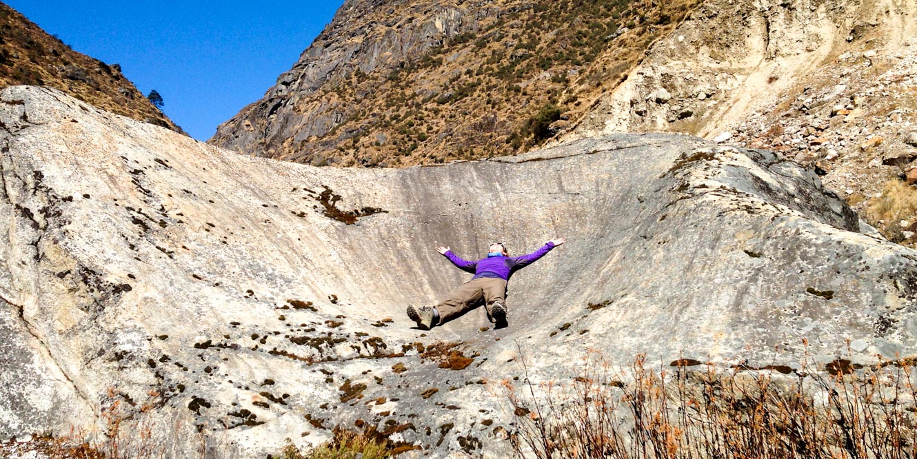 Woman lies in Nepal rock crater