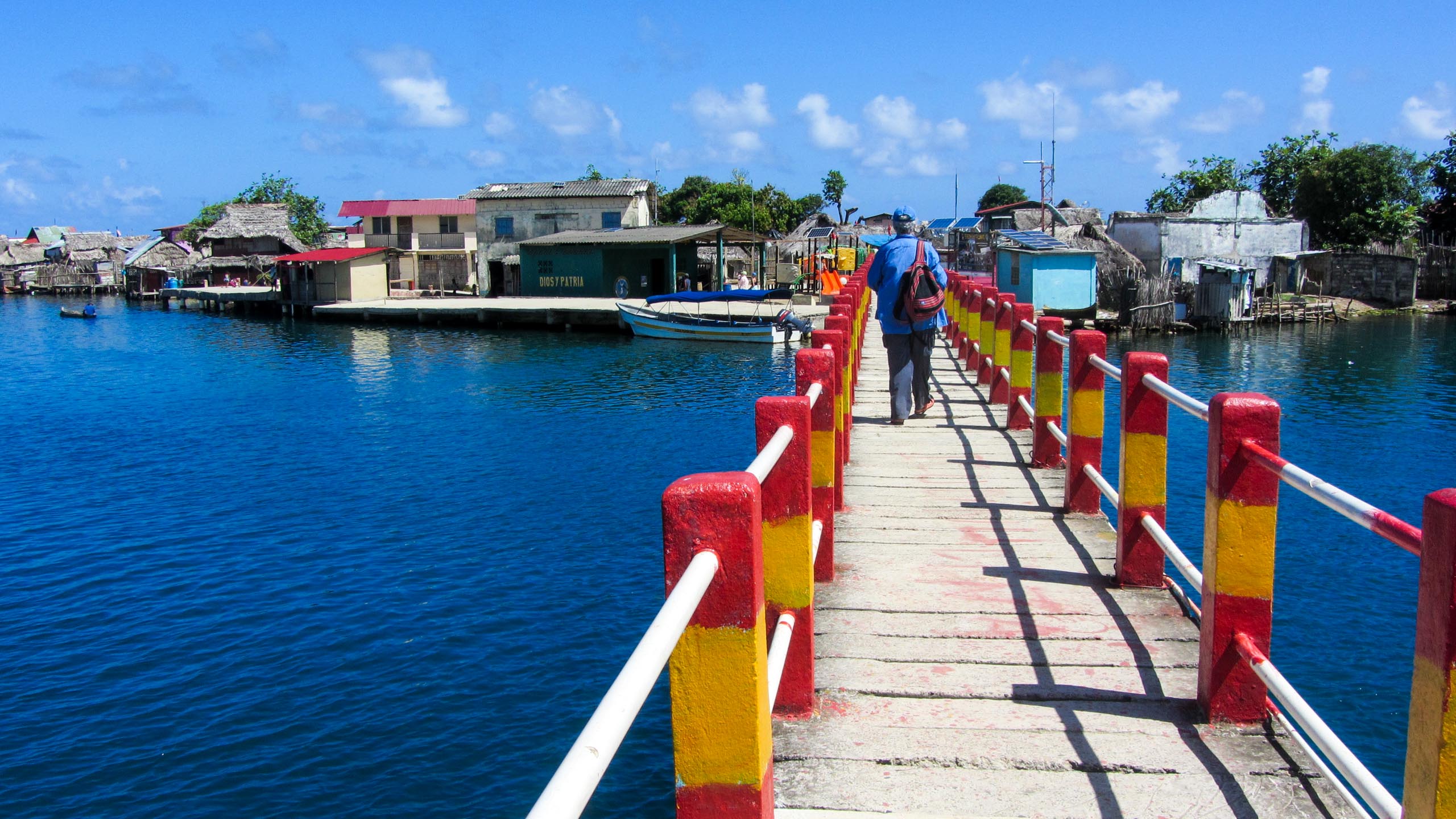 Woman walks across bridge in Panama