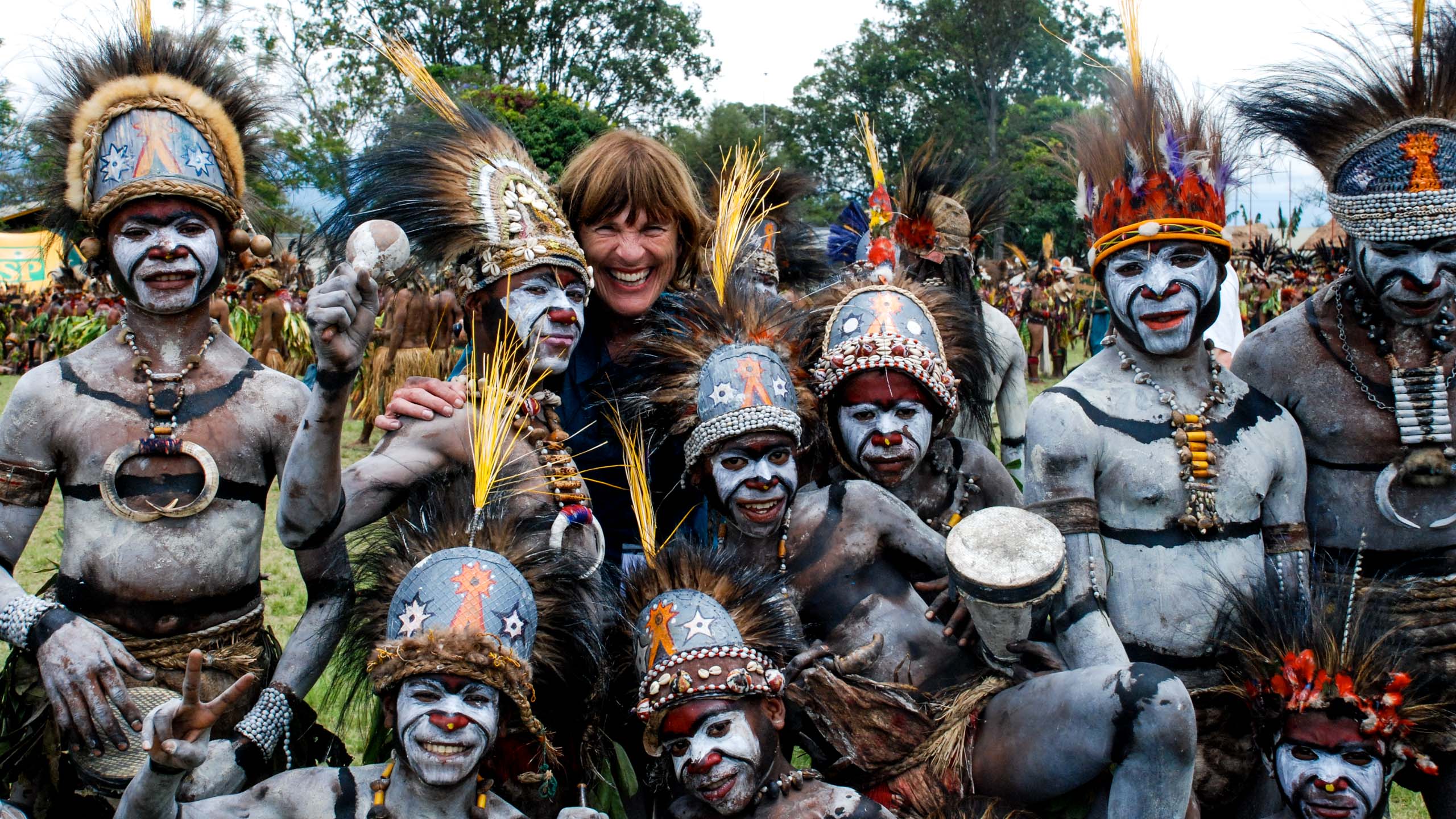 Traveler stands with Papua New Guinea tribe