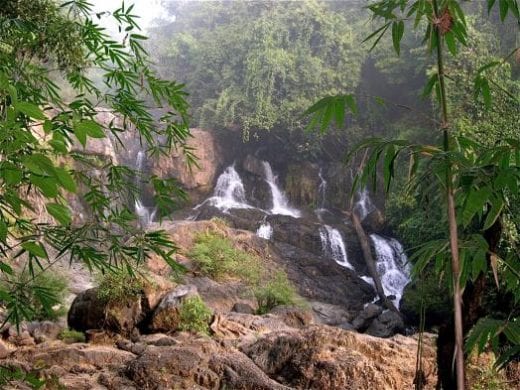 Swim at the base of a waterfall