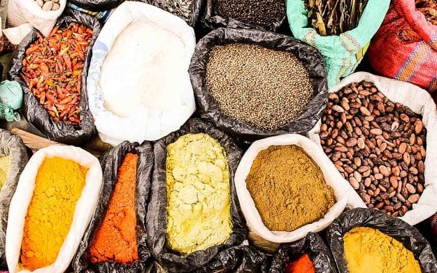 Bags of spices and seeds at Otavalo Market, Ecuador