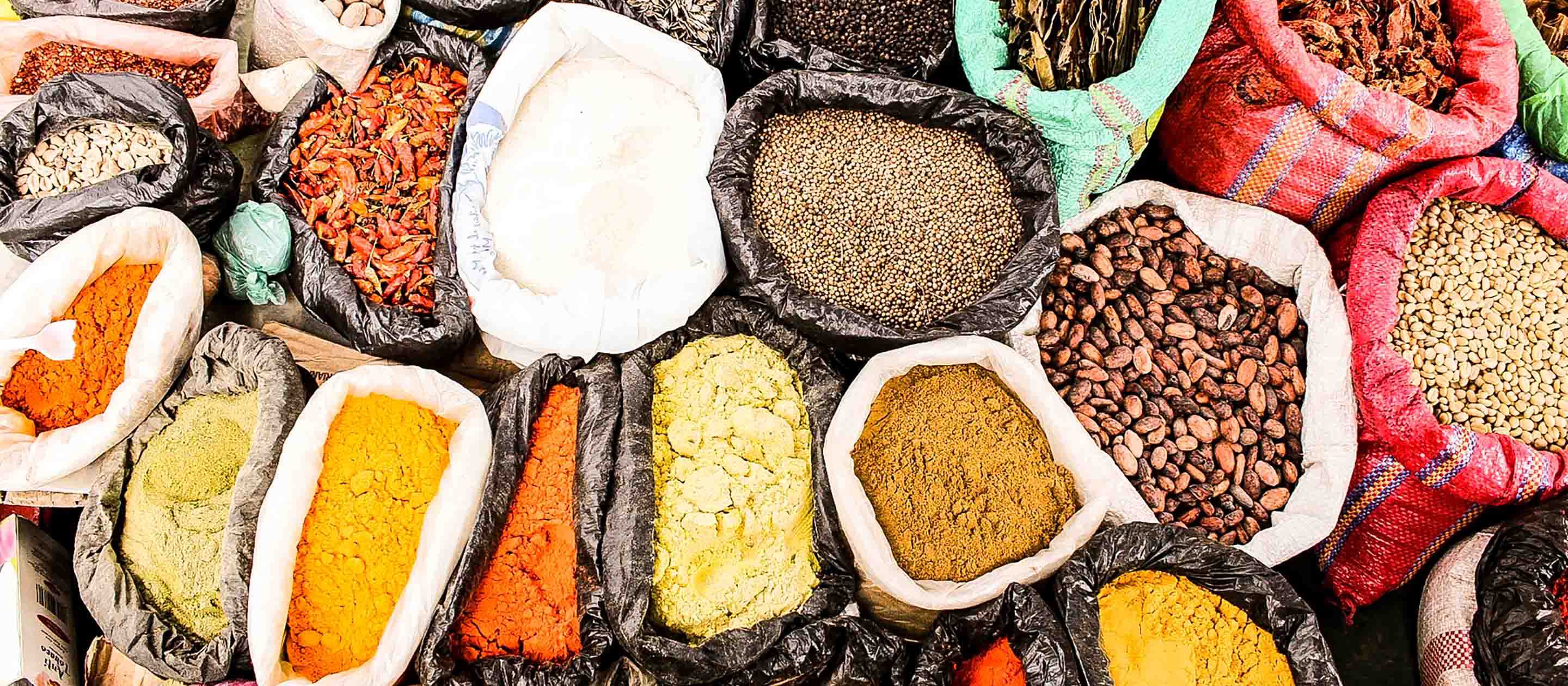 Bags of spices and seeds at Otavalo Market, Ecuador