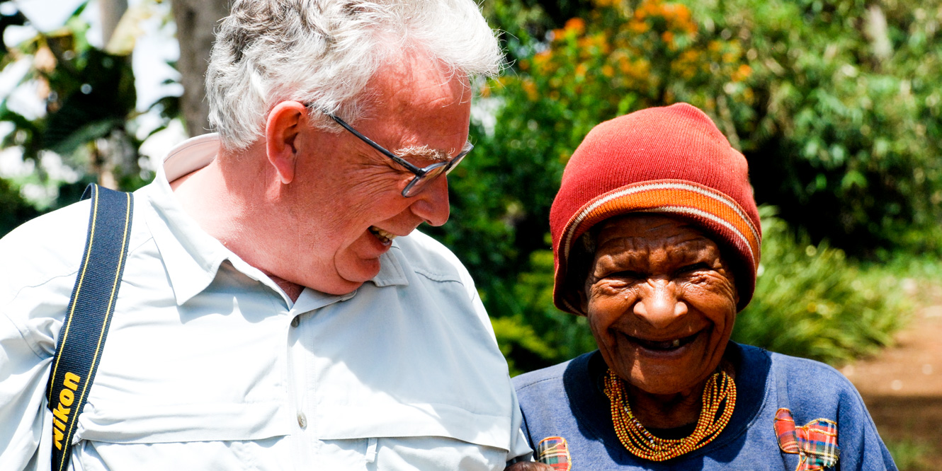 Traveler and Papua New Guinea native smiling