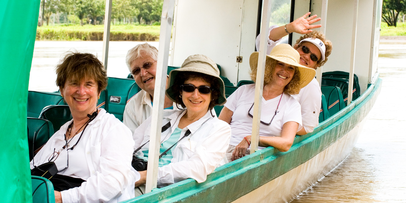 Group of travelers on boat tour