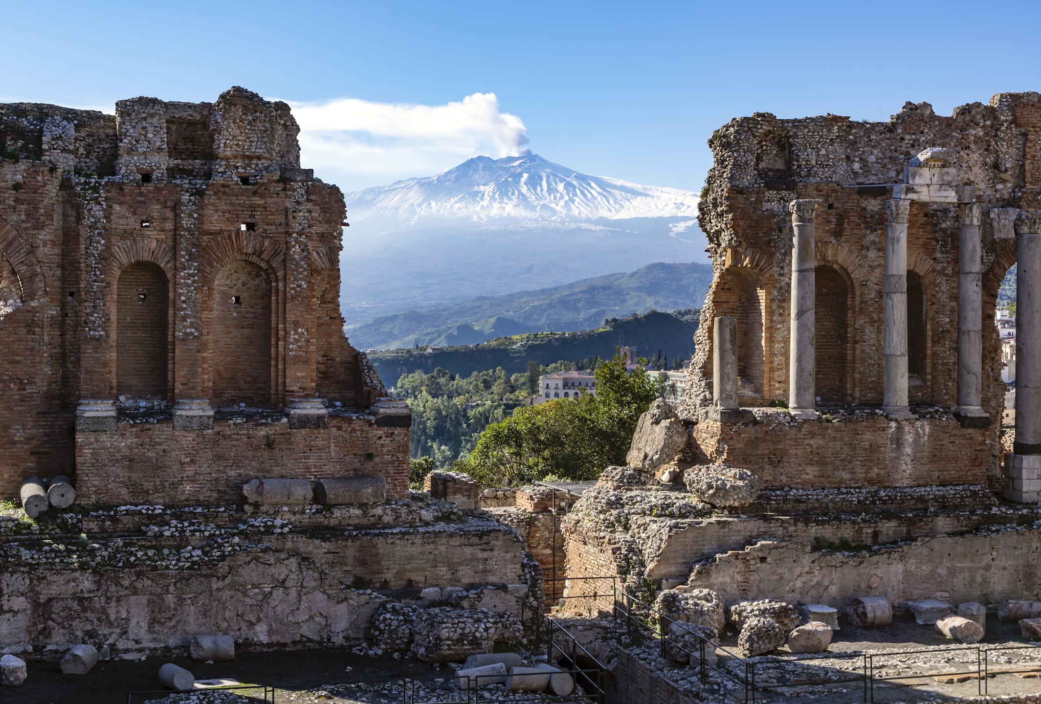 mt etna viewed though ruins