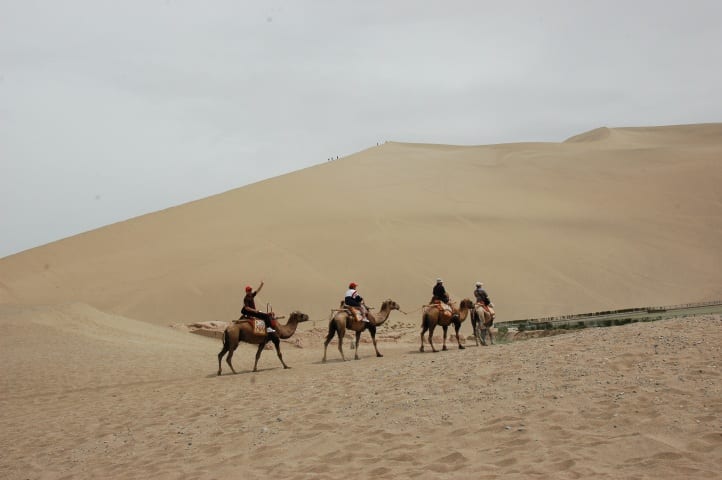 Consider a camel ride in the desert outside Hotan