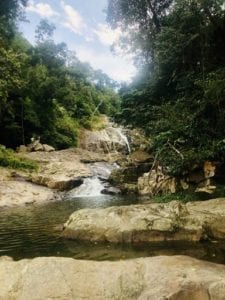 waterfall over boulders