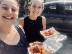 girls eating street food