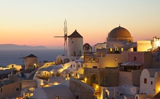 Oia village cityscape at sunset. Santorini. Greece.