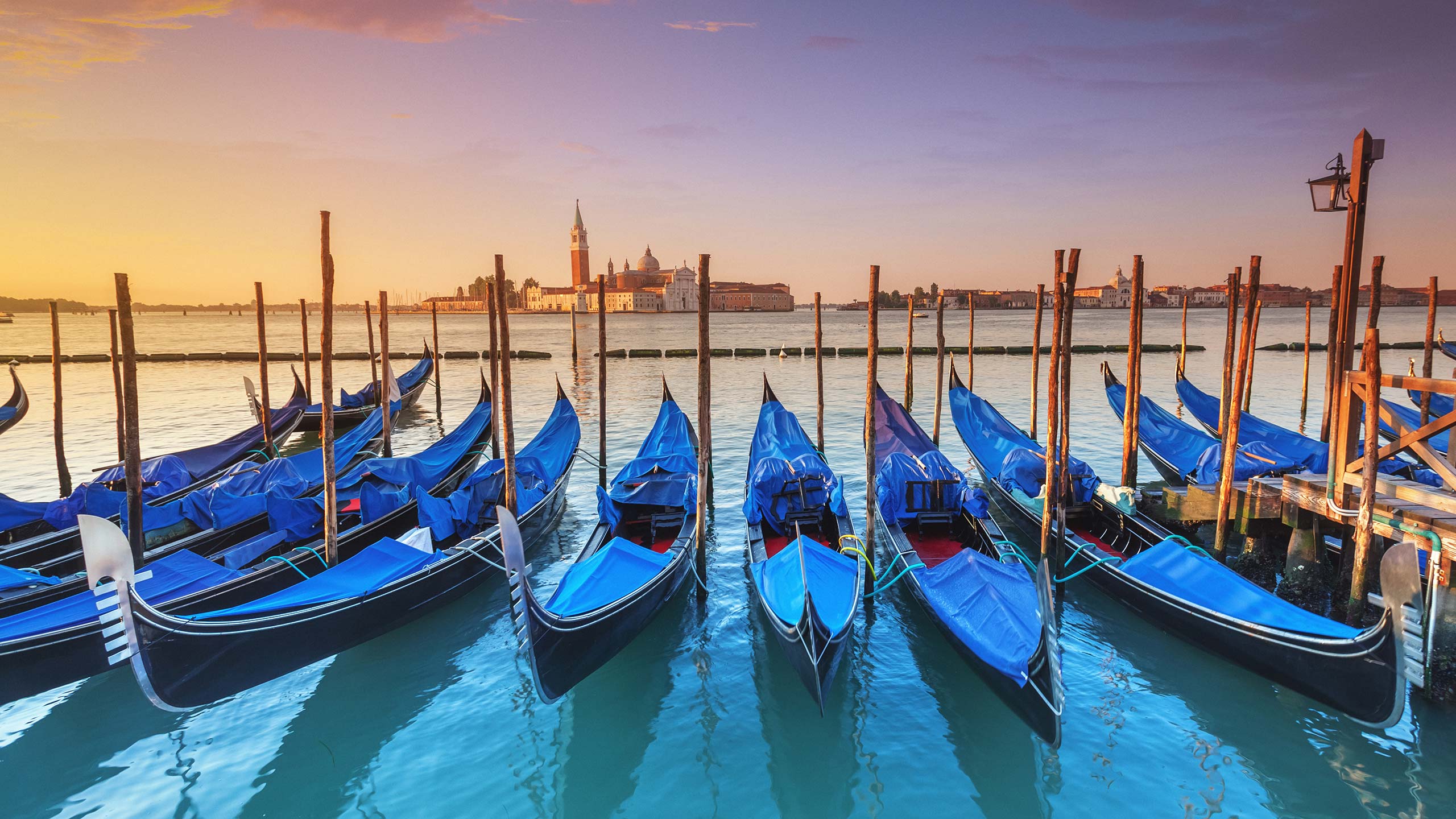 Gondolas in Venice at sunrise