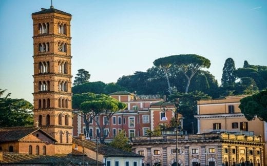 The sunset light illuminates the Aventine Hill in Rome