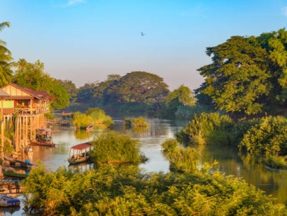 boats and stilt houses on river