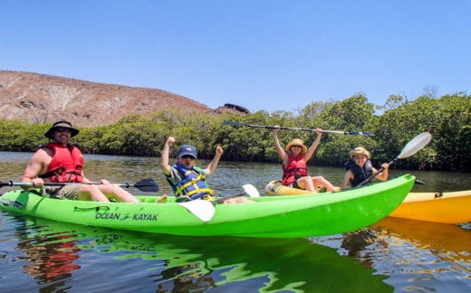 Family kayaking in Balandra Bay, Mexico